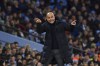 Manchester City's head coach Pep Guardiola gives instructions to his players during the English Premier League soccer match between Manchester City and Brentford at the Etihad stadium in Manchester, England, Tuesday, Feb. 20, 2024. (AP Photo/Rui Vieira)