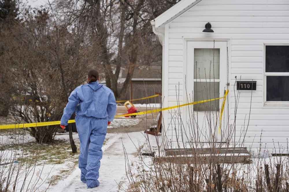 Forensic investigators on the scene of an ongoing investigation regarding five deaths in southern Manitoba, in Carman, Man., Monday, Feb. 12, 2024. People in Carman, Manitoba are scheduled to gather today for the funeral of five people killed in what RCMP have called an unimaginable tragedy. THE CANADIAN PRESS/David Lipnowski