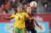 Canada's Sydney Collins, 2, battles Jamaica's Kameron Simmonds, 9, for the ball during first half CONCACAF women's championship soccer series match in Toronto on Tuesday Sept. 26, 2023.&nbsp;Canada will be without Collins at the CONCACAF W Gold Cup after the North Carolina Courage defender fractured her ankle in the Canadian pre-tournament camp.&nbsp;THE CANADIAN PRESS/Nathan Denette