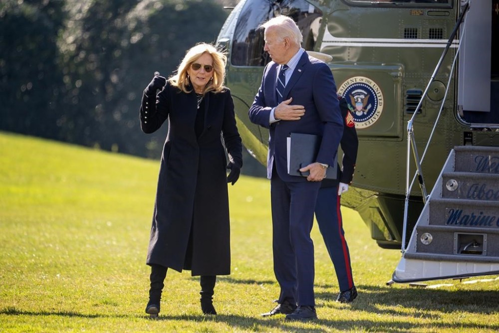 President Joe Biden , right, and first lady Jill Biden arrive at the White House in Washington, Monday, Feb. 19, 2024, after returning from Rehoboth Beach, Del. (AP Photo/Andrew Harnik)