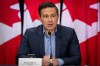 Conservative Leader Pierre Poilievre speaks during a press conference in Vancouver on Thursday, Feb. 8, 2024. Poilievre says a future Conservative government would make it a law for porn websites to verify the age of users, in order to prevent minors from accessing the content. THE CANADIAN PRESS/Ethan Cairns