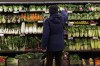 Almost two-thirds of Canadians say they have switched their primary grocery store in the past year to score better deals. A customer shops for produce at a grocery store In Toronto on Friday, Feb. 2, 2024. THE CANADIAN PRESS/Cole Burston