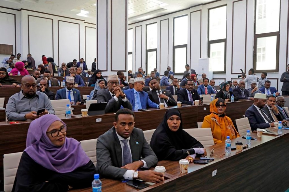 Somalia members of parliament listen to President Hassan Sheikh Mohamud at parliament buildings in Mogadishu, Somalia, Wednesday, Feb 21, 2024. Somalia announced a defense deal with Turkey to deter Ethiopia's access to sea through a breakaway region. Ethiopia signed a memorandum of understanding with Somaliland on Jan. 1. The document has rattled Somalia, which said it's prepared to go to war over it because it considers Somaliland part of its territory. (AP Photo/Farah Abdi Warsameh)