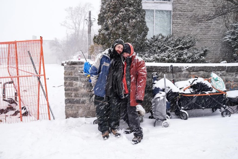 John Green and his partner, Jen Murphy, who are currently unhoused, are photographed outside the Bridge Street United Church in Belleville, Ont., on Thursday, February 15, 2024. Ontario Premier Doug Ford's government says it needs a business plan before funding a proposed health and social services hub in an eastern Ontario city beleaguered by opioids. THE CANADIAN PRESS/Chris Young