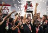 Fourteen clubs, including three newcomers, will take part in the 2024 Canadian Championship, a four-round competition set to kick off in April. Vancouver Whitecaps' Ryan Raposo hoists the Voyageurs Cup after Vancouver defeated CF Montreal 2-1 during the Canadian Championship soccer final, in Vancouver, B.C., Wednesday, June 7, 2023. THE CANADIAN PRESS/Darryl Dyck