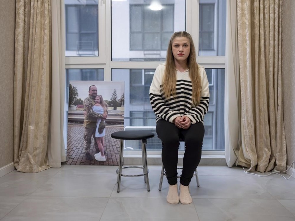 Hanna Rudak, 27, sits in her rented apartment while waiting for the return of her husband Andrii in Kyiv, Ukraine on Feb. 12, 2024. Andrii Rudak, 28, a Ukrainian serviceman with the 30th Mechanized Brigade disappeared during the fighting against Wagner forces at the frontline in Odradivka, Donetsk region on Oct. 15, 2022. Hanna often dreams of Andrii returning to her alive.