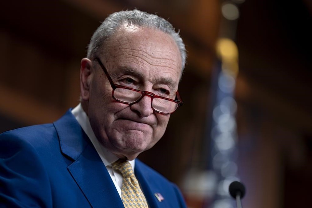 Senate Majority Leader Chuck Schumer, D-N.Y., speaks to reporters after a divided Senate passed an emergency spending package to provide send military aid to Ukraine and Israel, replenish U.S. weapons systems, and provide food, water and other humanitarian aid to civilians in Gaza, at the Capitol in Washington, Tuesday, Feb. 13, 2024. The measure has an uncertain future in the House where it is opposed by Republicans in the face of pressure from former President Donald Trump. (AP Photo/J. Scott Applewhite)