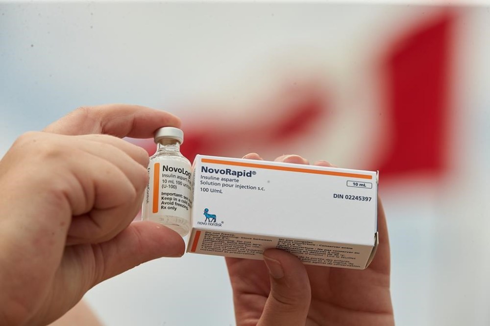 The NDP says it has reached a deal with the governing Liberals to introduce the first piece of a national pharmacare program that includes coverage for birth control and diabetes medication. Allison Nimlos, of Minnesota, holds up her American bottle of NovoLog insulin and a Canadian box of NovoRapid, which she picked up at a Walmart pharmacy in London, Ont., Saturday, June 29, 2019. THE CANADIAN PRESS/Geoff Robins