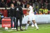Mainz's Jessic Ngankam, right, leaves the pitch after receiving a red card during the German Bundesliga soccer match between Bayer 04 Leverkusen and 1. FSV Mainz 05 at the BayArena in Leverkusen, Germany, Friday, Feb. 23, 2024. (AP Photo/Martin Meissner)