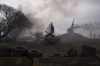 FILE - Smoke rise from an air defense base in the aftermath of an apparent Russian strike in Mariupol, Ukraine, on Feb. 24, 2022. Ukraine is marking Saturday, Feb. 24, 2024, two years since Russia’s full-scale invasion, with a string of foreign dignitaries and officials expected to visit the capital, Kyiv, in solidarity as Ukrainian forces run low on ammunition and weaponry and Western aid hangs in the balance. (AP Photo/Evgeniy Maloletka, File)