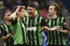 Sassuolo's Andrea Pinamonti, left, celebrates scoring with teammates during the Serie A soccer match between Sassuolo and Empoli at Mapei Stadium, Reggio Emilia, Italy, Saturday Feb. 24, 2024. (Massimo Paolone/LaPresse via AP)