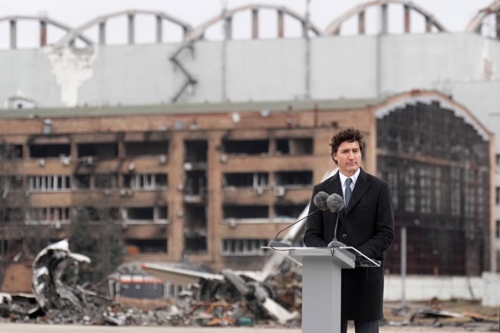 Canadian Prime Minister Justin Trudeau pauses during a ceremony at Hostomel Airport in Kyiv, Ukraine on Saturday, February 24, 2024. The ceremony was to mark the second anniversary of the start of the war in Ukraine. THE CANADIAN PRESS/Nathan Denette