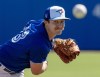 Toronto Blue Jays starting pitcher Chad Dallas throws a warmup pitch at the start of opening day Spring Training action against the Philadelphia Phillies in Dunedin, Fla. on Saturday February 24, 2024. THE CANADIAN PRESS/Frank Gunn