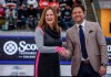 The Canadian Press sports reporter Donna Spencer receives the Paul McLean Award from TSN sportscaster Bryan Mudryk at the Scotties Tournament of Hearts in Calgary, Saturday, Feb. 24, 2024. The award is named in honour of the highly-respected TSN Producer of curling, CFL football, and world juniors hockey who died of cancer at the age of 39 in December of 2005. THE CANADIAN PRESS/Jeff McIntosh