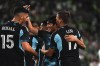 Minnesota United FC forward Jeong San-Bin (11), center, and defender Michael Boxall (15), celebrate a goal by midfielder Robin Lod (17) during an MLS soccer match at Q2 stadium in Austin, Texas, Saturday, Feb. 24, 2024. (Aaron E. Martinez/Austin American-Statesman via AP)