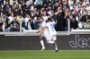 Frosinone's Walid Cheddira, left, celebrates after scoring their side's first goal of the game during the Serie A soccer match between Juventus and Frosinone at the Allianz Stadium in Turin, north west Italy, Sunday, Feb. 25, 2024. (Marco Alpozzi/LaPresse via AP)