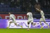 Rennes' Amine Gouiri, left, celebrates with teammates after scoring his side's opening goal during the French League One soccer match between Paris Saint-Germain and Rennes, at the Parc des Princes stadium in Paris, France, Sunday, Feb. 25, 2024. (AP Photo/Michel Euler)
