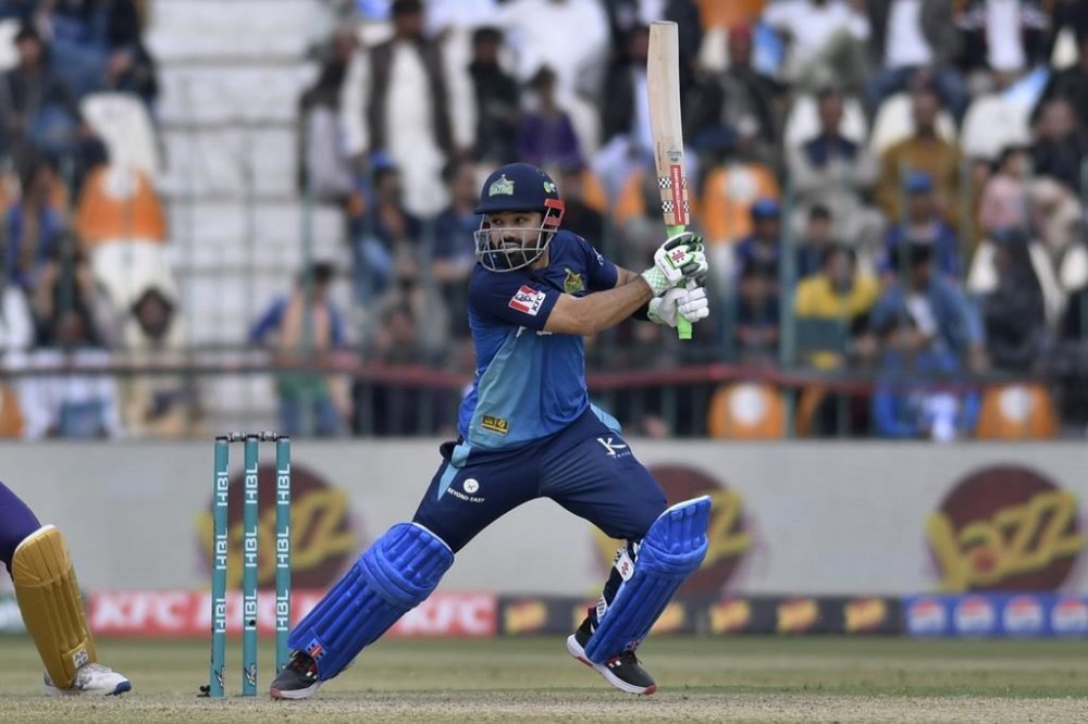 Multan Sultans' Mohammad Rizwan plays a shot during the Pakistan Super League T20 cricket match between Multan Sultans and Quetta Gladiators, in Multan, Pakistan, Sunday, Feb. 25, 2024. (AP Photo/M. Khan)