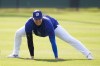 Los Angeles Dodgers designated hitter Shohei Ohtani participates in spring training baseball workouts at Camelback Ranch in Los Angeles, Sunday, Feb. 25, 2024. (AP Photo/Ashley Landis)