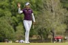 Patty Tavatanakit of Thailand reacts on the 2nd during the final round of the LPGA Honda Thailand golf tournament in Pattaya, southern Thailand, Sunday, Feb. 25, 2024. (AP Photo/Kittinun Rodsupan)