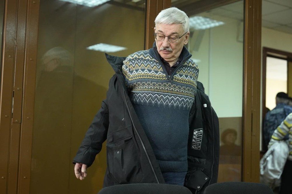 The co-chair of the Nobel Peace Prize winning Memorial Human Rights Centre Oleg Orlov arrives to attend a court session for a new trial on charges of repeated discrediting Russian military, in Moscow, Russia, Monday, Feb. 26, 2024. (AP Photo/Alexander Zemlianichenko)
