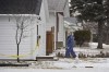 A judge has ordered a Manitoba man accused of killing five family members, including his three young children, undergo a mental health assessment to determine whether he is fit to stand trial. Forensic investigators work at the scene of an ongoing investigation regarding five deaths in southern Manitoba, in Carman, Man., Monday, Feb. 12, 2024. THE CANADIAN PRESS/David Lipnowski