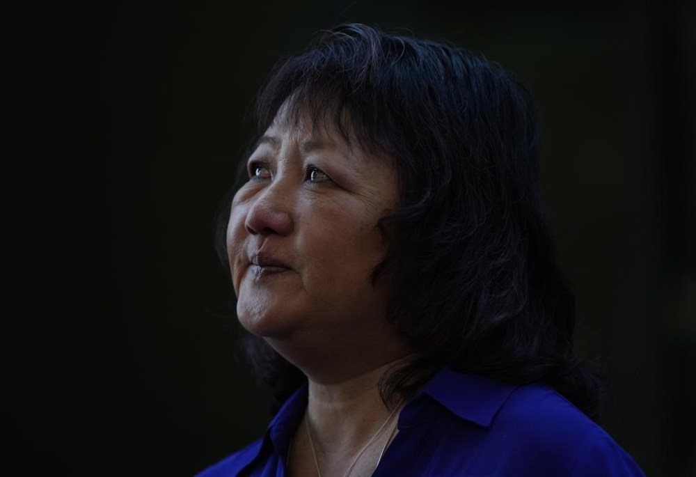 Carol Todd, the mother of a British Columbia teen who died by suicide after being targeted by online sextortion, is pleading with federal lawmakers to pass a bill expected to be tabled today in Parliament on protecting youth from online harms. Todd pauses outside B.C. Supreme Court after sentencing for the Dutch man who was accused of extorting and harassing her daughter, in New Westminster, B.C., on Friday, October 14, 2022. THE CANADIAN PRESS/Darryl Dyck