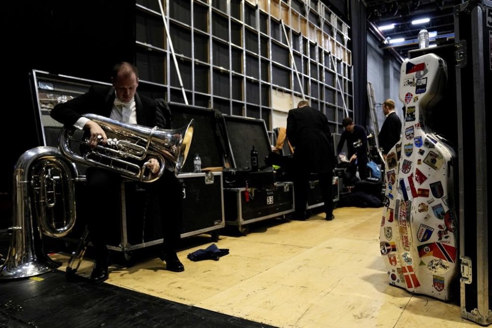 Musicians of the National Symphony Orchestra (NSO) wait at the backstage prior to the start of the concert at Milan's La Scala theatre, Italy, Monday, Feb. 26, 2024. (AP Photo/Antonio Calanni)