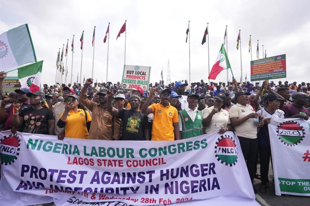 Labour unionist march on the streets to protest economic hardship in Lagos Nigeria, Tuesday, Feb. 27, 2024. Nigerian Labour Union workers began a new nationwide protest Tuesday, that threatens to shut down key services across the country. Protestors are angry at the growing economic hardship with talks late Monday night breaking down to avert the walkout. (AP Photo/Sunday Alamba)
