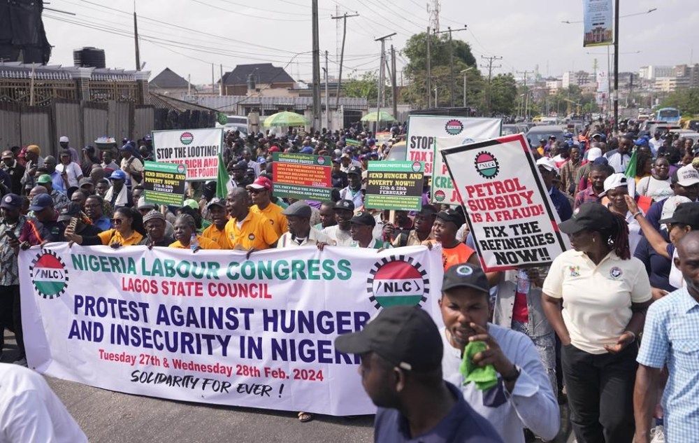 Labour unionist march on the streets to protest economic hardship in Lagos Nigeria, Tuesday, Feb. 27, 2024. Nigerian Labour Union workers began a new nationwide protest Tuesday, that threatens to shut down key services across the country. Protestors are angry at the growing economic hardship with talks late Monday night breaking down to avert the walkout. (AP PhotoSunday Alamba)