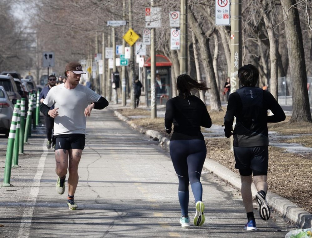 Most Canadians can look forward to a warmer-than-normal spring, but they should also brace for the season’s “profound mood swings,” according to The Weather Network's latest outlook. Runners enjoy the mild temperatures in Montreal on Tuesday, February 27, 2024.THE CANADIAN PRESS/Ryan Remiorz