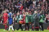 Liverpool's Ryan Gravenberch is stretchered off after an injury during the English League Cup final soccer match between Chelsea and Liverpool at Wembley Stadium in London, Sunday, Feb. 25, 2024. (AP Photo/Dave Shopland)