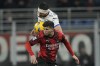 AC Milan's Christian Pulisic, and Atalanta's Sead Kolasinac, up, go for a header during a Serie A soccer match between AC Milan and Atalanta at the San Siro stadium in Milan, Italy, Sunday, Feb. 25, 2024. (AP Photo/Antonio Calanni)