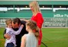 FILE - Boston Red Sox pitcher Tim Wakefield, center left, hugs his son, Trevor, 7, as his wife, Stacy, right, and daughter, Brianna, 6, look on after Wakefield announced his retirement from baseball during a news conference, Friday, Feb. 17, 2012, in Fort Myers, Fla. Stacy Wakefield, the widow of former Boston Red Sox pitcher and two-time World Series champion Tim Wakefield, has died. Wakefield's family said in a statement released through the Red Sox that she died Wednesday, Feb. 28, 2024 at her Massachusetts home, less than five months after her husband died at the age of 57. (AP Photo/David Goldman, File)