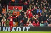 Liverpool's Lewis Koumas, right, celebrates after scoring his side's opening goal during the English FA Cup fifth round soccer match between Liverpool and Southampton at Anfield stadium, in Liverpool, Wednesday, Feb. 28, 2024. (AP Photo/Jon Super)