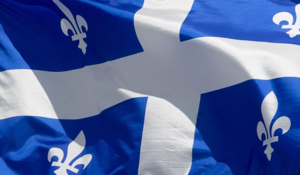 The mayor of Louiseville, Que. says a wild turkey that for weeks sowed terror in the small town 95 kilometres northeast of Montreal was killed this morning by a man armed with a slingshot. Quebec's provincial flag flies on a flag pole in Ottawa on June 30, 2020. THE CANADIAN PRESS/Adrian Wyld