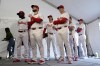FILE - Philadelphia Phillies players wait to have their photo taken during a baseball spring training photo day Thursday, Feb. 22, 2024, in Clearwater, Fla. Baseball players’ association head Tony Clark is hopeful 2024 uniforms will soon be altered following complaints by his members. The uniforms designed by Nike and manufactured by Fanatics have been criticized by players for pants that are somewhat see through and for lettering, sleeve emblems and numbering that are less bulky and apparently smaller.(AP Photo/Charlie Neibergall, File)