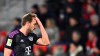 Munich's Harry Kane reacts during the Bundesliga soccer match between SC Freiburg and Bayern Munich at the Europa-Park Stadium in Freiburg Im Breisgau, Germany, Friday March 1, 2024. (Tom Weller/dpa via AP)