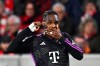 Munich's Mathys Tel celebrates after scoring their side's first goal of the game during the Bundesliga soccer match between SC Freiburg and Bayern Munich at the Europa-Park Stadium in Freiburg Im Breisgau, Germany, Friday March 1, 2024. (Tom Weller/dpa via AP)