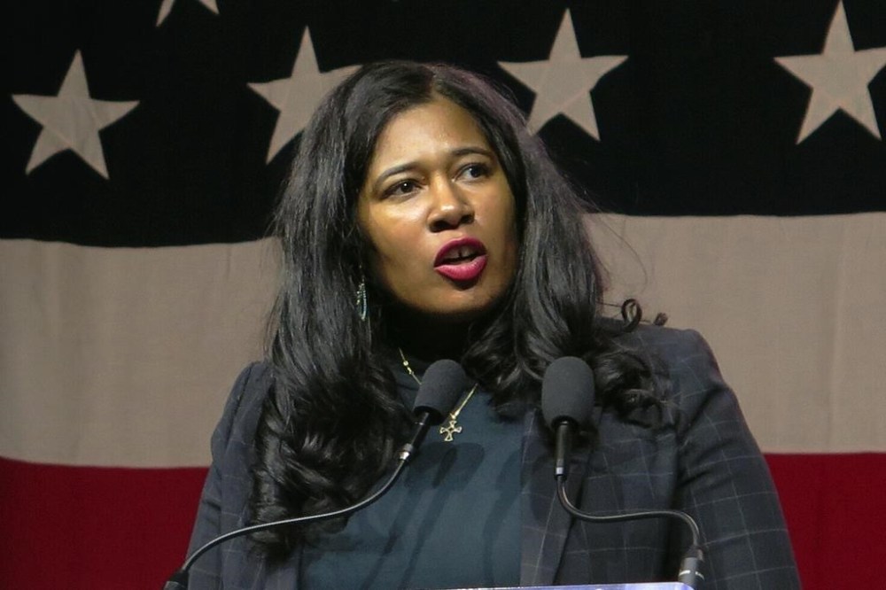 FILE - Kristina Karamo speaks to Michigan Republican Party delegates on Feb. 18, 2023, in Lansing, Mich. The Republican nominating convention Saturday, March 2, 2024, in Grand Rapids, where they will allocate 39 of the state's 55 GOP presidential delegates, comes just days after a Kent County judge affirmed that former Michigan GOP Chair Karamo was removed properly by party members in January. (AP Photo/Joey Cappelletti, File)