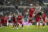 Newcastle United's Dan Burn, top right, heads the ball during the English Premier League soccer match between Newcastle United and Wolverhampton Wanderers at the St James' Park, in Newcastle, England, Saturday, March 2, 2024. (Owen Humphreys/PA via AP)