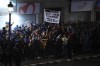 Valencia fans hold a banner critical of Real Madrid's Vinicius Junior ahead of the La Liga soccer match between Valencia and Real Madrid at the Mestalla Stadium in Valencia, Spain, Saturday, March 2, 2024. (AP Photo/Jose Breton)