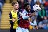 Burnley's David Datro Fofana, right, and Bournemouth's Chris Mepham battle for the ball during the English Premier League soccer match between Burnley and Bournemouth at Turf Moor, Burnley, England, Sunday March 3, 2024. (Nigel French/PA via AP)