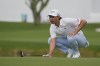 Min Woo Lee, of Australia, lines his shot on the third hole during the final round of the Cognizant Classic golf tournament, Sunday, March 3, 2024, in Palm Beach Gardens, Fla. (AP Photo/Marta Lavandier)