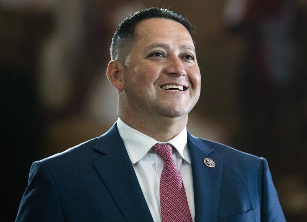 FILE - Rep. Tony Gonzales, R-Texas, is seen before the flag-draped casket bearing the remains of Hershel W.