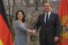German Foreign Minister Annalena Baerbock, left, shakes hands with Minister of Foreign Affairs of Montenegro, Filip Ivanovic, in Montenegro's capital Podgorica, Monday, March 4, 2024. Baerbock is on a one-day official visit to Montenegro. (AP Photo/Risto Bozovic)