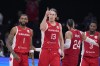 Canada's Kelly Olynyk (13) gestures during the Basketball World Cup bronze medal game between the United States and Canada in Manila, Philippines, Sunday, Sept. 10, 2023. The Canadian men's basketball team qualified for the 2024 Olympic Games led by a clutch of homegrown NBA stars.But that success could be short-lived, with the Canadian Olympic and Paralympic Committee, along with national sports organizations like Canada Basketball, speaking out about federal funding shortfalls that could impact which athletes attend future games.  THE CANADIAN PRESS/AP/Michael Conroy