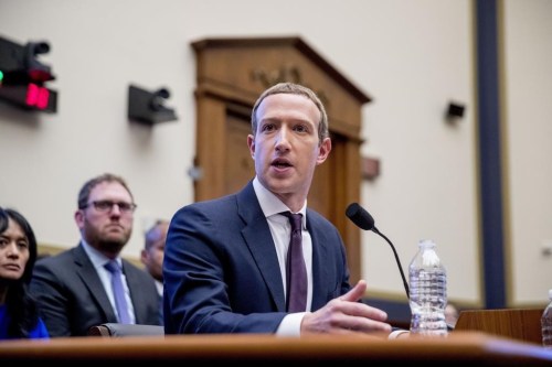 FILE - Facebook CEO Mark Zuckerberg testifies before a House Financial Services Committee hearing on Capitol Hill in Washington, Oct. 23, 2019. Attorneys for Meta Platforms and several of its current and former leaders, including founder Zuckerberg, are asking a Delaware judge to dismiss a shareholder lawsuit alleging the company has deliberately failed to protect users of its social media platforms from human trafficking and child sexual exploitation. (AP Photo/Andrew Harnik, File)