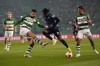 Sporting's Sebastian Coates, left, and Atalanta's Ademola Lookman challenge for the ball during the Europa League round of sixteen, first leg, soccer match between Sporting CP and Atalanta at the Alvalade stadium in Lisbon, Wednesday, March 6, 2024. (AP Photo/Armando Franca)