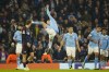 Manchester City's Erling Haaland, center, celebrates with his teammates after he scored his side's third goal during a Champions League round of sixteen second leg soccer match between Manchester City and Copenhagen, at the Etihad Stadium in Manchester, England, Wednesday, March 6, 2024. (AP Photo/Dave Thompson)